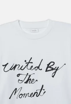 John Elliott United by the Moment Tee